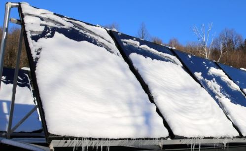 Snow Covered Solar Panel - 2.JPG